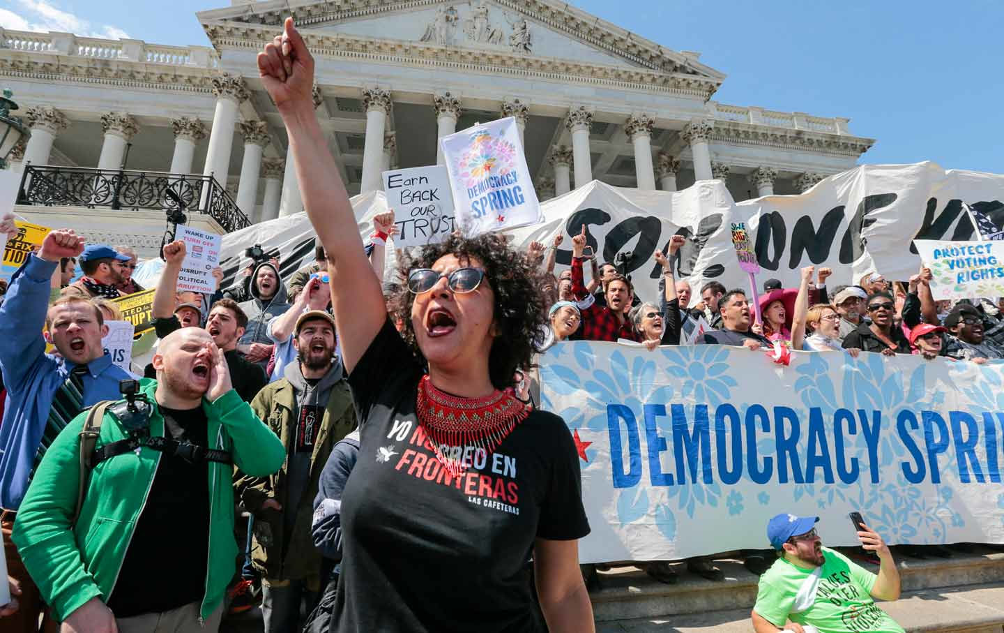 This Arizona woman leads a chant as voting-rights demonstrators stage a sit-in at the Capitol. She's not part of the problem. (A﻿P Photo / J. Scott Applewhite)