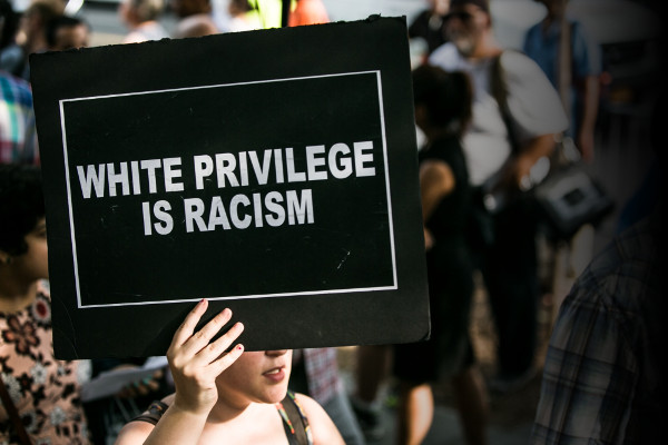 A sign at a July 7, 2016 protesting the epidemic of unsanctioned police murder targeting black communities in the United States (Karla Ann Cote via Getty Images)